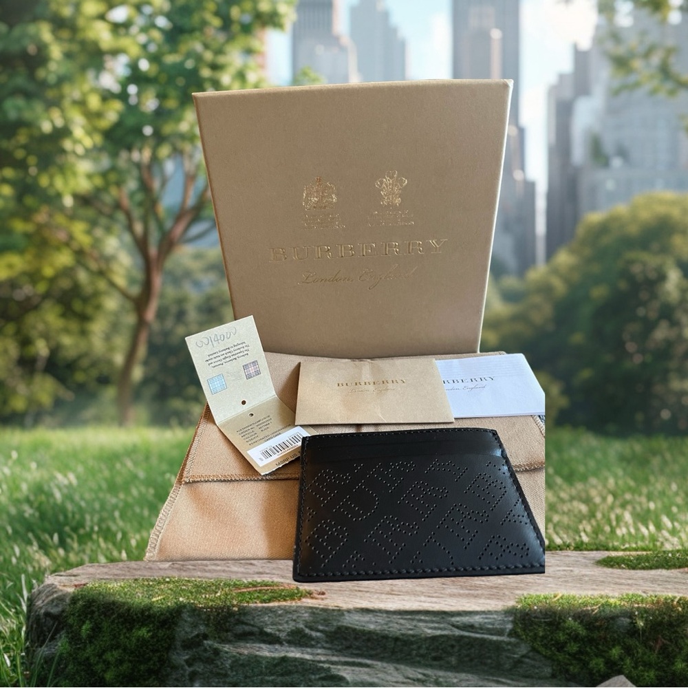 Burberry card holder with dust bag and box.
